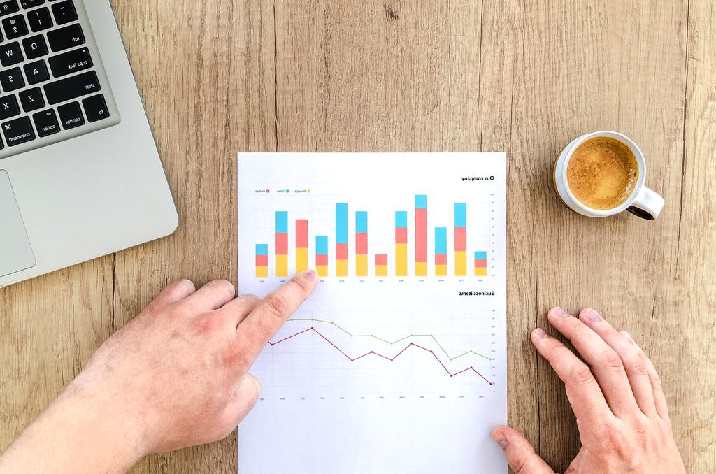 Person analyzing environmental impact data from event